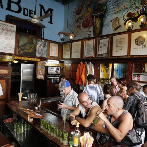 Tourists fill the famous La Bodeguita del Medio bar where U.S. author Ernest Hemingway used to drink in Old Havana.